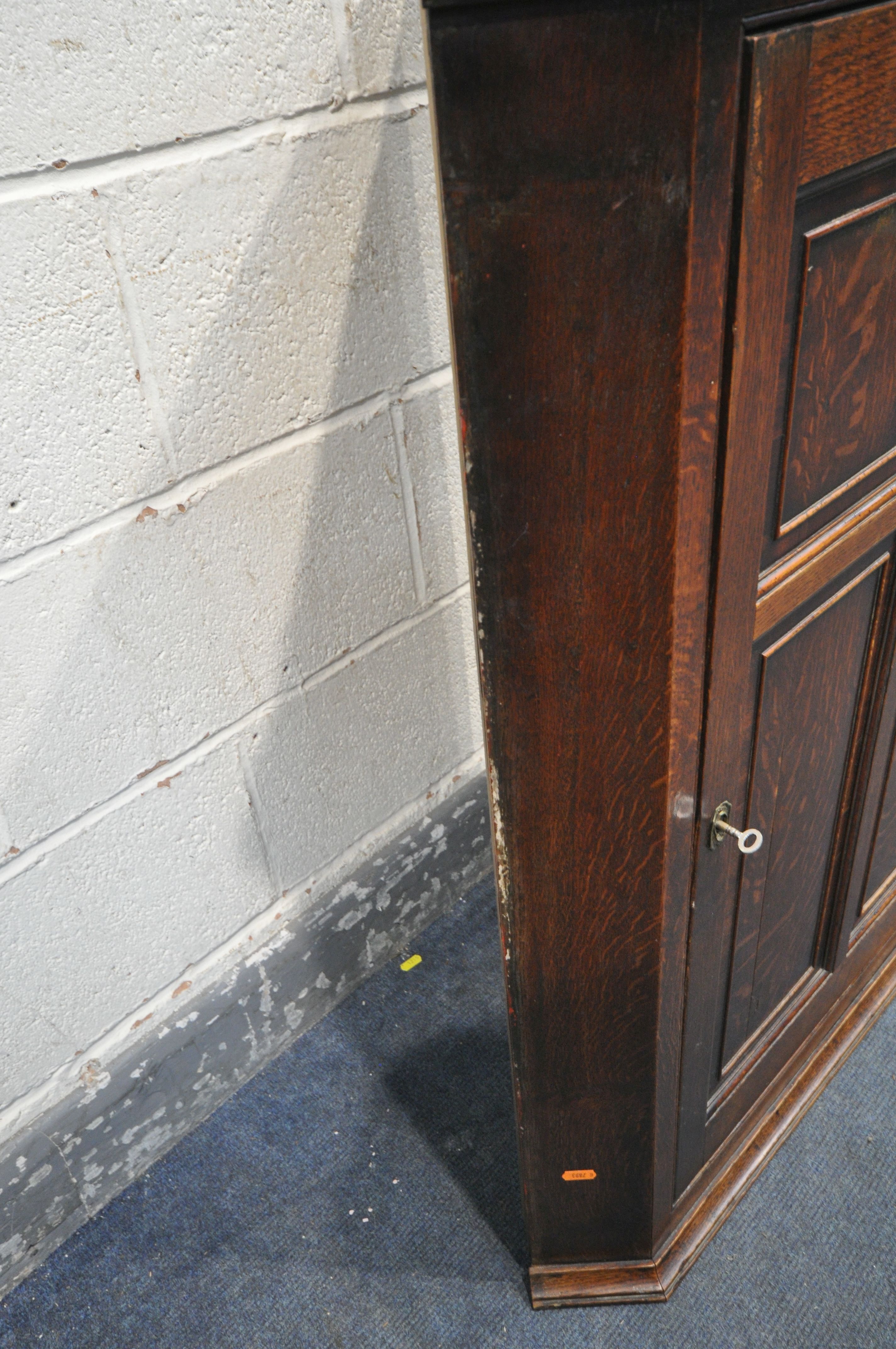 A GEORGIAN OAK SINGLE PANEL DOOR HANGING CORNER CUPBOARD, enclosing two shelves (condition - loose - Image 2 of 2