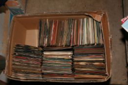 A TRAY CONTAINING OVER FOUR HUNDRED 7in SINGLES including a number by Petula Clark, a Number by