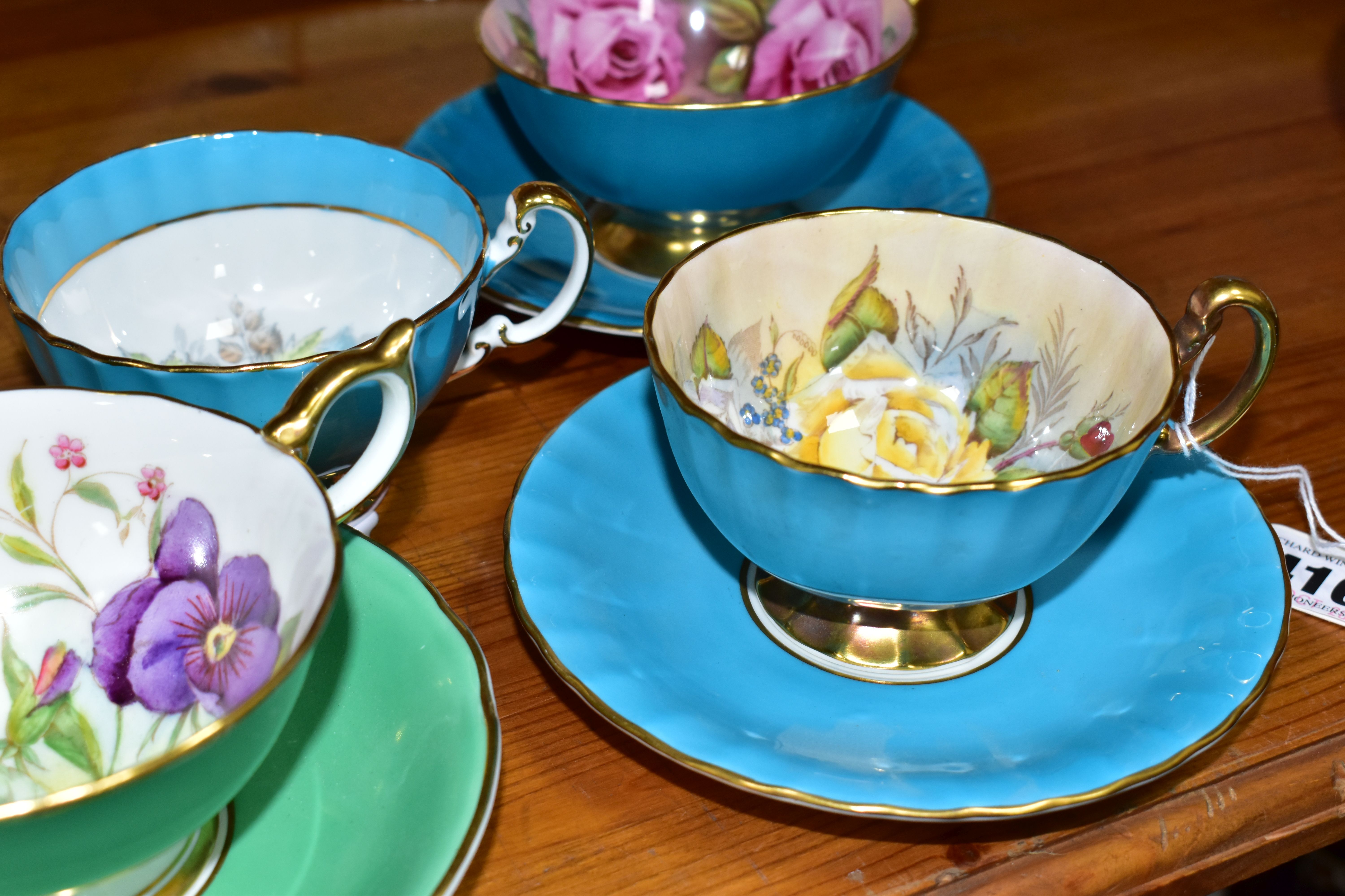 SIX AYNSLEY CABINET CUPS AND THREE SAUCERS, comprising a green cup and saucer, the interior of the - Image 3 of 7