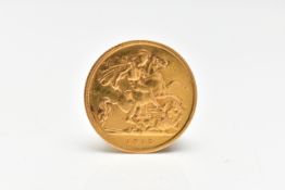 A GEORGE V HALF SOVEREIGN COIN, obverse depicting George V, reverse displaying George and the