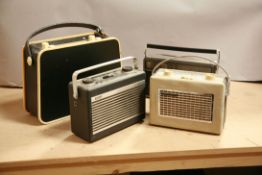 FOUR VINTAGE TRANSISTOR RADIO comprising od a Hacker Mini Herald in Cream and Black, a Hacker
