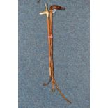 A GROUP OF EARLY 20TH CENTURY CANES AND HORSE CROP, comprising a silver topped cane, monogramed AHS,