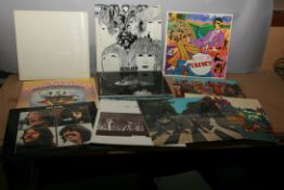SIXTEEN LPs BY THE BEATLES AND CONTRIBUTING ARTISTS comprising of The Beatles ( no 370337) 1st