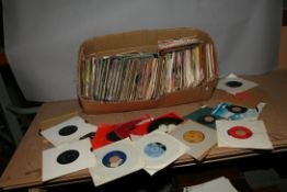 A TRAY CONTAINING OVER TWO HUNDRED AND EIGHTY 7in SINGLES including Elvis Presley, Mama's and the
