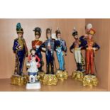 SIX CAPODIMONTE BRUNO MERLI FIGURES OF SOLDIERS IN HISTORICAL COSTUME OF 1798-1844 AND A GOEBEL