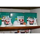 FOUR BOXED COALPORT RAYMOND BRIGGS' FATHER CHRISTMAS FIGURES, comprising two 'Line Dancing'