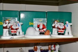 FOUR BOXED COALPORT RAYMOND BRIGGS' FATHER CHRISTMAS FIGURES, comprising two 'Line Dancing'