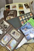 POSTCARDS, 1st DAY COVERS & EPHEMERA, three albums containing approximately 310 postcards dating
