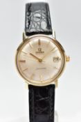 A GENTLEMANS OMEGA SEAMASTER WRISTWATCH, the circular champagne dial, with baton hourly markers,