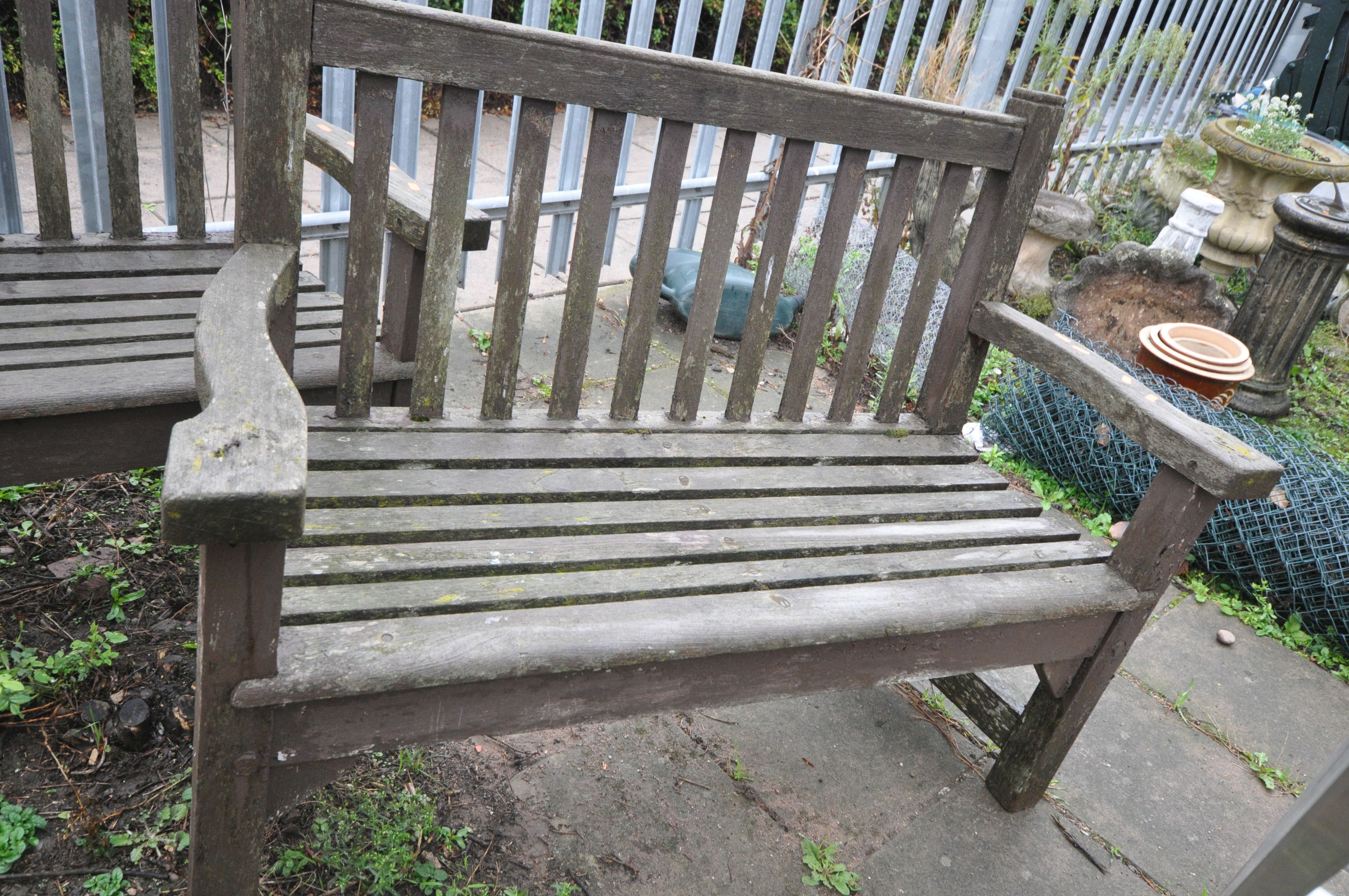 A PAIR OF WOODEN GARDEN BENCHES, width 129cm (Condition:- Weathered) - Image 3 of 3