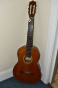 A VINTAGE JAPANESE SIX STRING ACOUSTIC GUITAR, label to the inside reads B & M Soloist, hand made by
