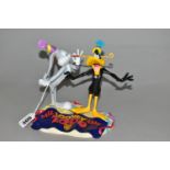 A WEDGWOOD LIMITED EDITION 'MIL-LOONEY-UM' FIGURE GROUP, depicting Bugs Bunny and Daffy Duck, 883/