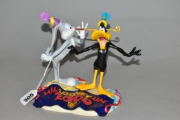 A WEDGWOOD LIMITED EDITION 'MIL-LOONEY-UM' FIGURE GROUP, depicting Bugs Bunny and Daffy Duck, 883/