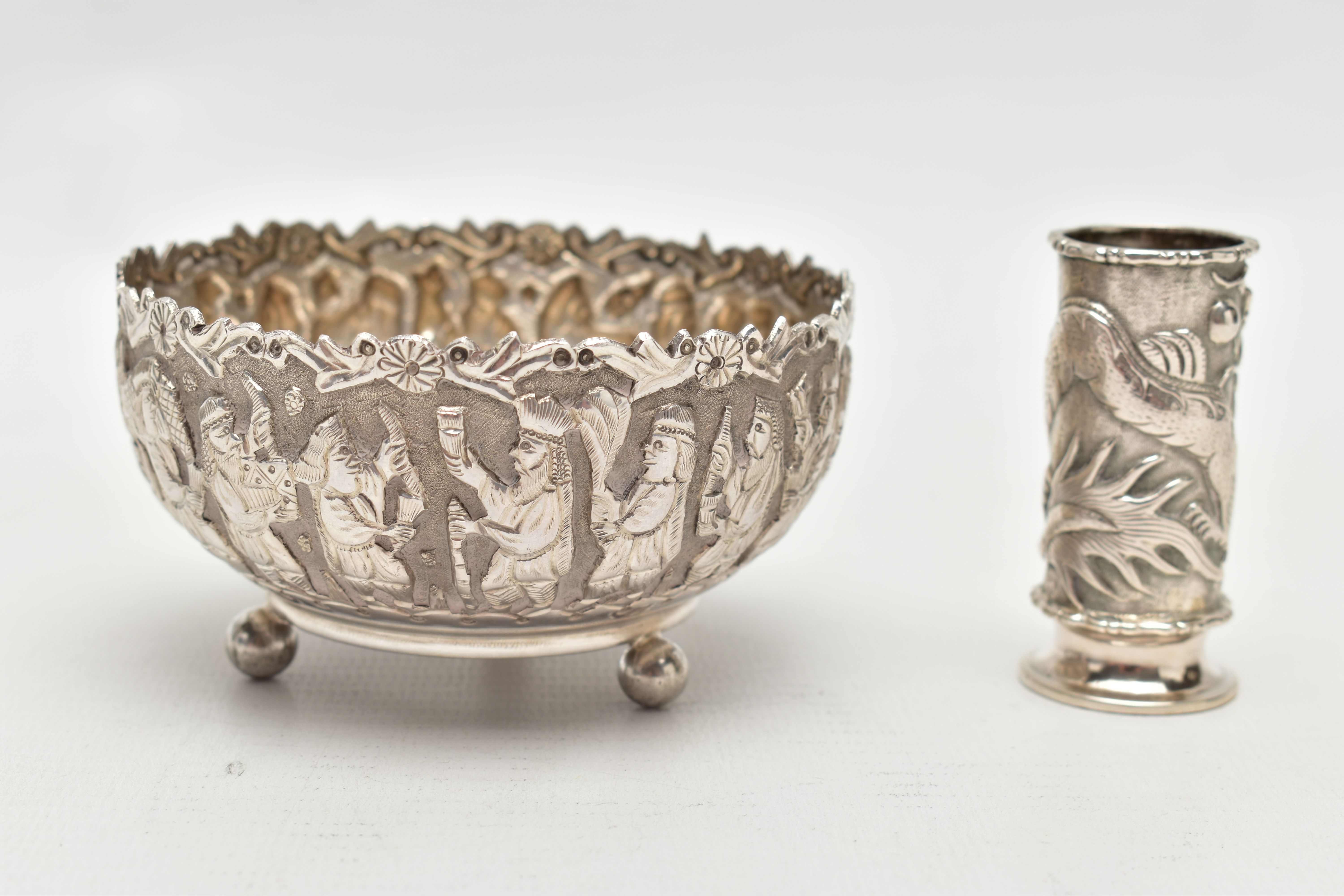 AN EMBOSSED WHITE METAL BOWL AND SMALL VASE, the round bowl decorated with embossed multiple figural - Image 2 of 7