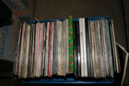 A TRAY CONTAINING APPROX ONE HUNDRED AND TWENTY LPs 12in SINGLES AND TOUR PROGRAMMES including