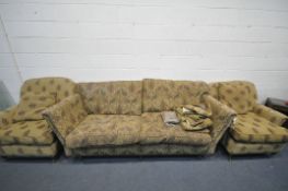 A THREE PIECE LOUNGE SUITE, comprising a three seater sofa with floral upholstery, length 224cm, and