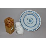 AN EIGHTEENTH CENTURY DELFT PLATE AND ORIENTAL ITEMS, comprising a carved stone table seal with