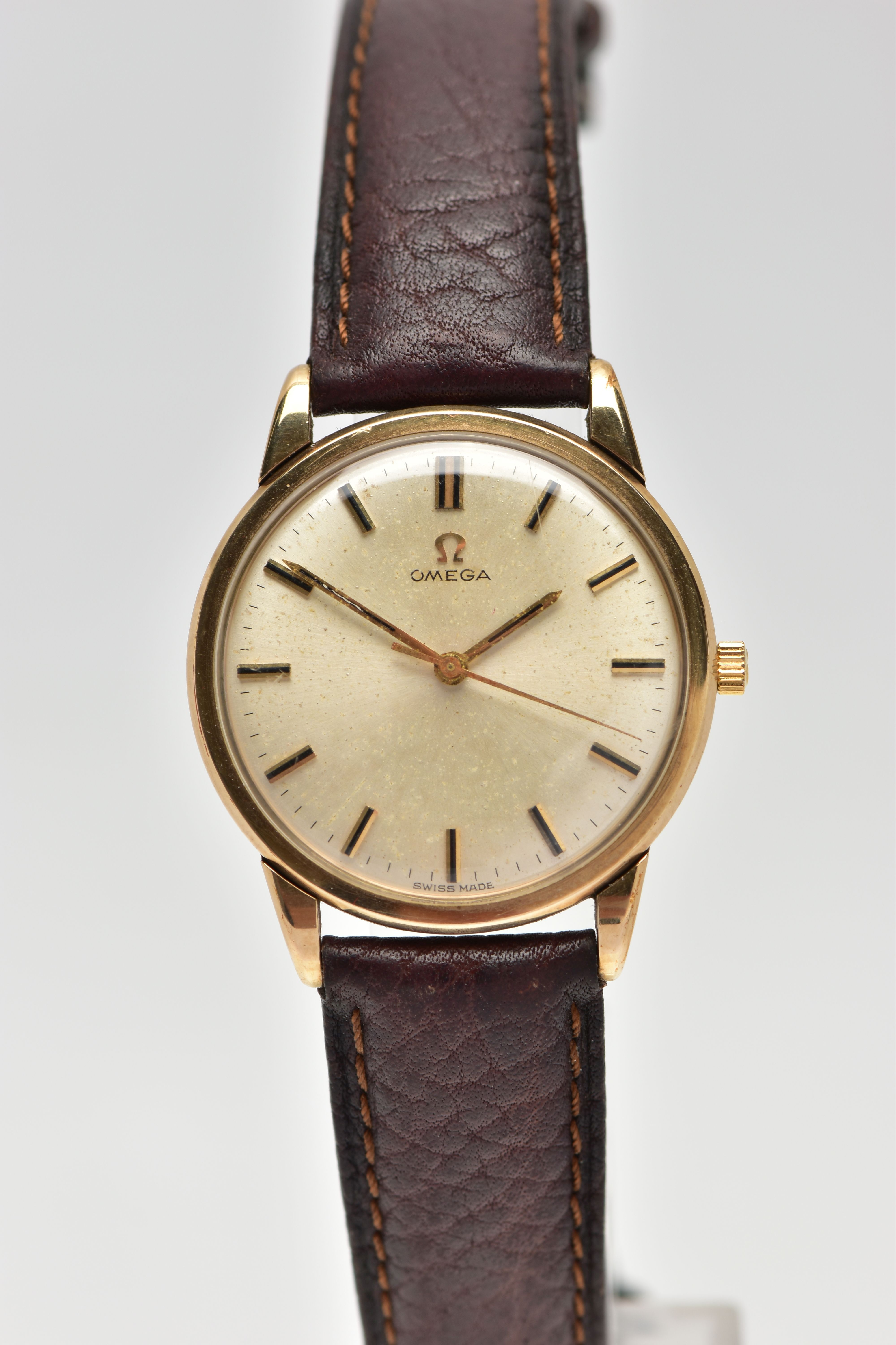 A GENTS 1960'S, 9CT GOLD 'OMEGA' WRISTWATCH, manual wind, round champagne dial signed 'Omega', baton