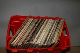 A TRAY CONTAINING APPROX NINETY LPs BY ELVIS PRESLEY including some originals, some reissues and