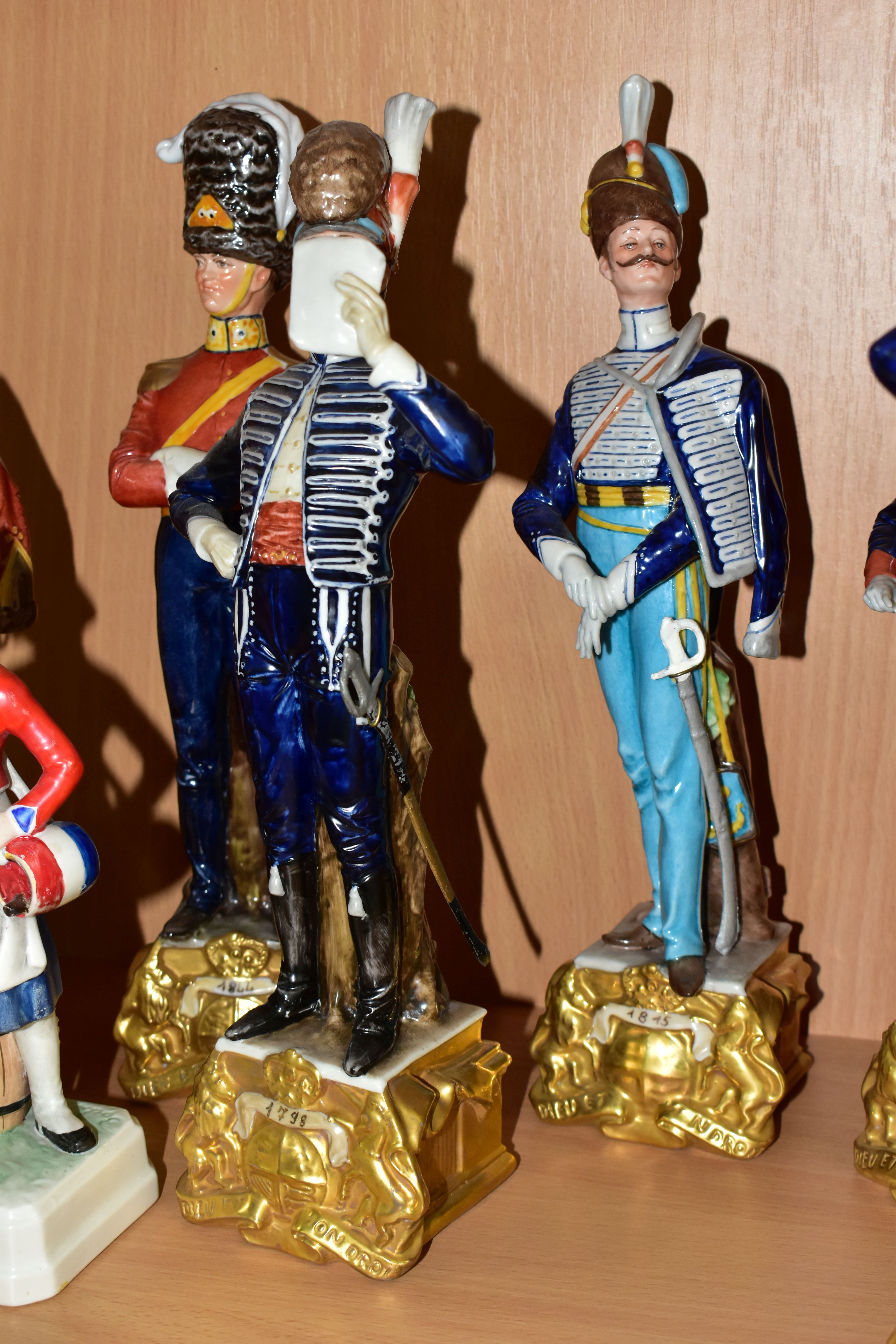 SIX CAPODIMONTE BRUNO MERLI FIGURES OF SOLDIERS IN HISTORICAL COSTUME OF 1798-1844 AND A GOEBEL - Image 3 of 5