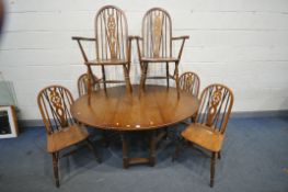 AN OLD CHARM OAK OVAL GATE LEG TABLE, open length 153cm x closed length 48cm x depth 114cm x