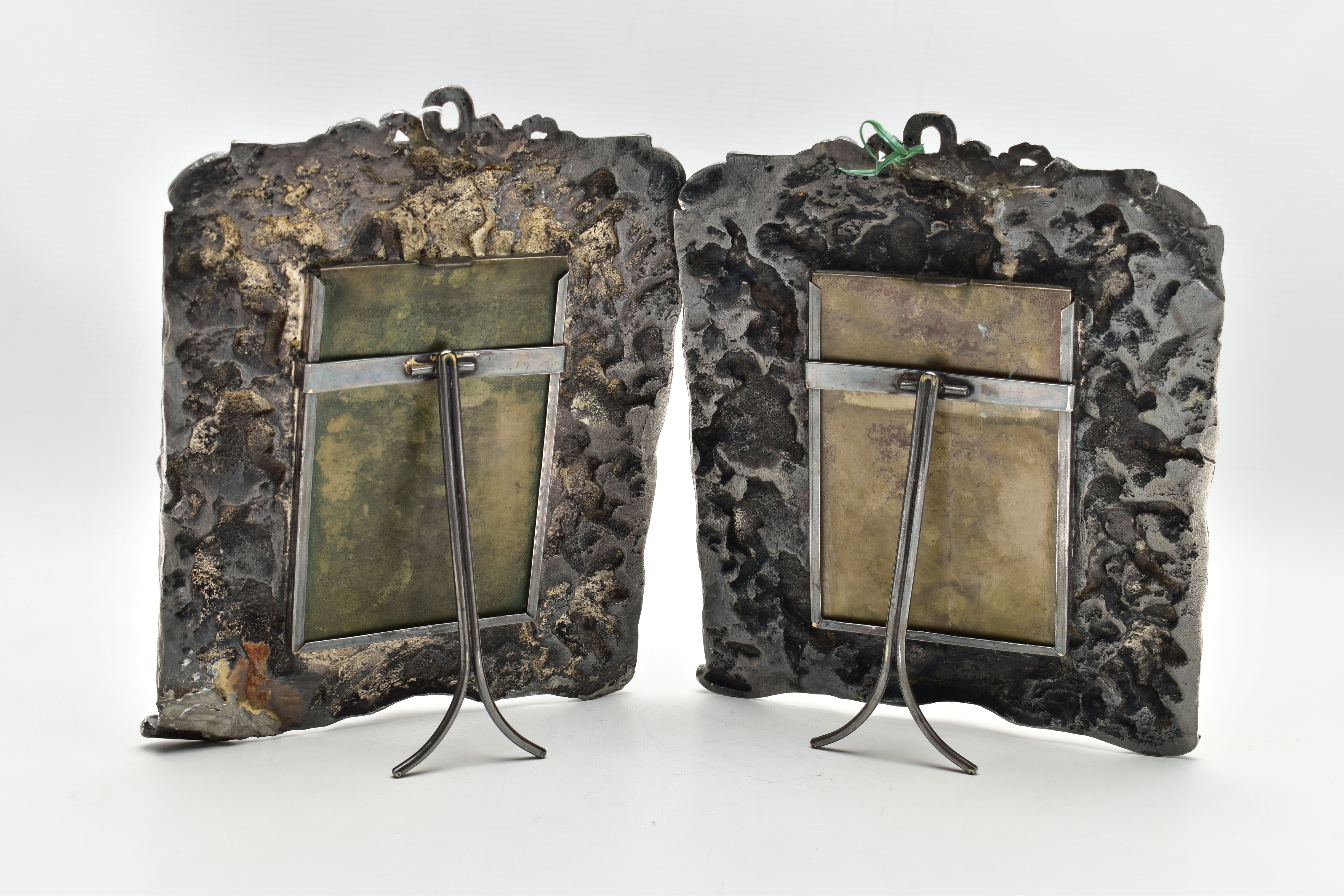 A PAIR OF WHITE METAL PHOTO FRAMES, rectangular form, detailed with a number of cherubs, a woman and - Image 7 of 7