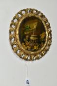 A 19TH CENTURY GILT FRAMED OVAL PAPIER MACHÉ PAINTING, of an exotic parrot, fountain and foliate