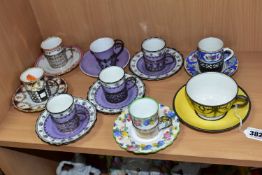 AN EARLY 20TH CENTURY AYNSLEY YELLOW TEA CUP AND SAUCER WITH WHITE METAL OVERLAY AND SEVEN AYNSLEY