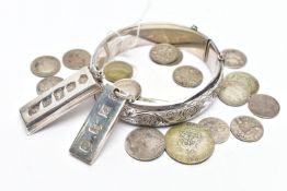 A SELECTION OF SILVER JEWELLERY AND COINS, to include a silver hinged bangle, of engraved foliate