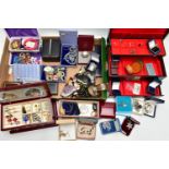 A LARGE ASSORTMENT OF COSTUME JEWELLERY AND BOXES, to include copper bangles, assorted earrings,