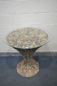 A CIRCULAR DRIFTWOOD TABLE, with a glass top, diameter 76cm x height 81cm (good condition)