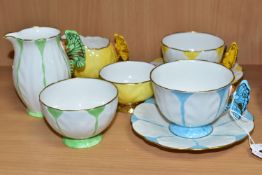 EIGHT PIECES OF AYNSLEY BUTTERFLY HANDLED TEA WARES, moulded in petal-like sections, comprising a