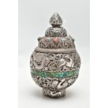 A WHITE METAL DECORATIVE VASE, detailed with tigers, lions, dragons and other animals within a