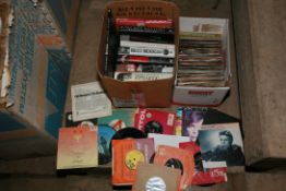 TWO TRAYS CONTAINING APPROX ONE HUNDRED AND TWENTY FIVE SINGLES and ten books pertaining to