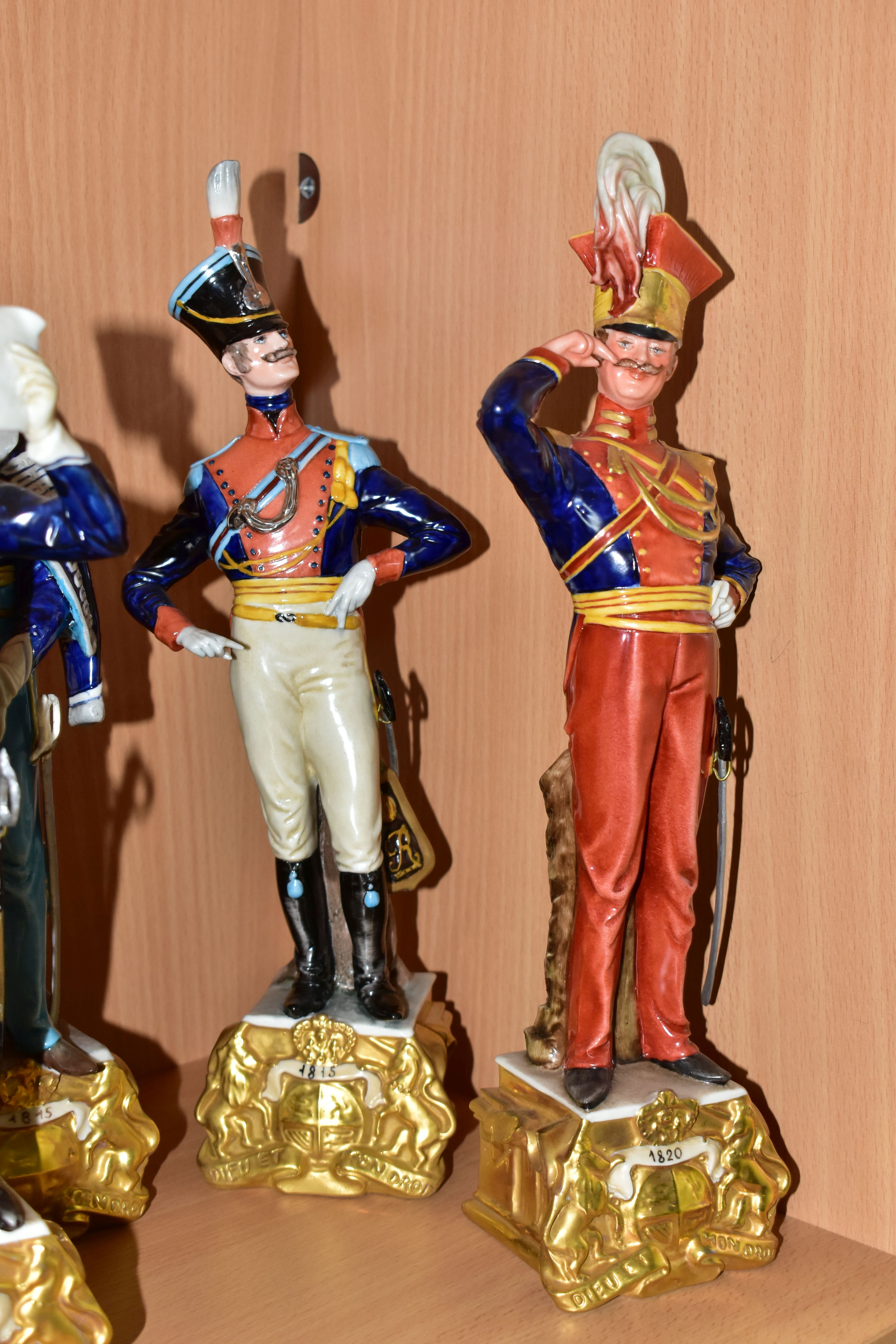 SIX CAPODIMONTE BRUNO MERLI FIGURES OF SOLDIERS IN HISTORICAL COSTUME OF 1798-1844 AND A GOEBEL - Image 2 of 5