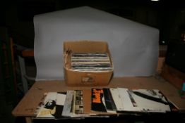 A TRAY CONTAINING OVER ONE HUNDRED AND TEN LPs, 78s AND SINGLES including In Through The Out