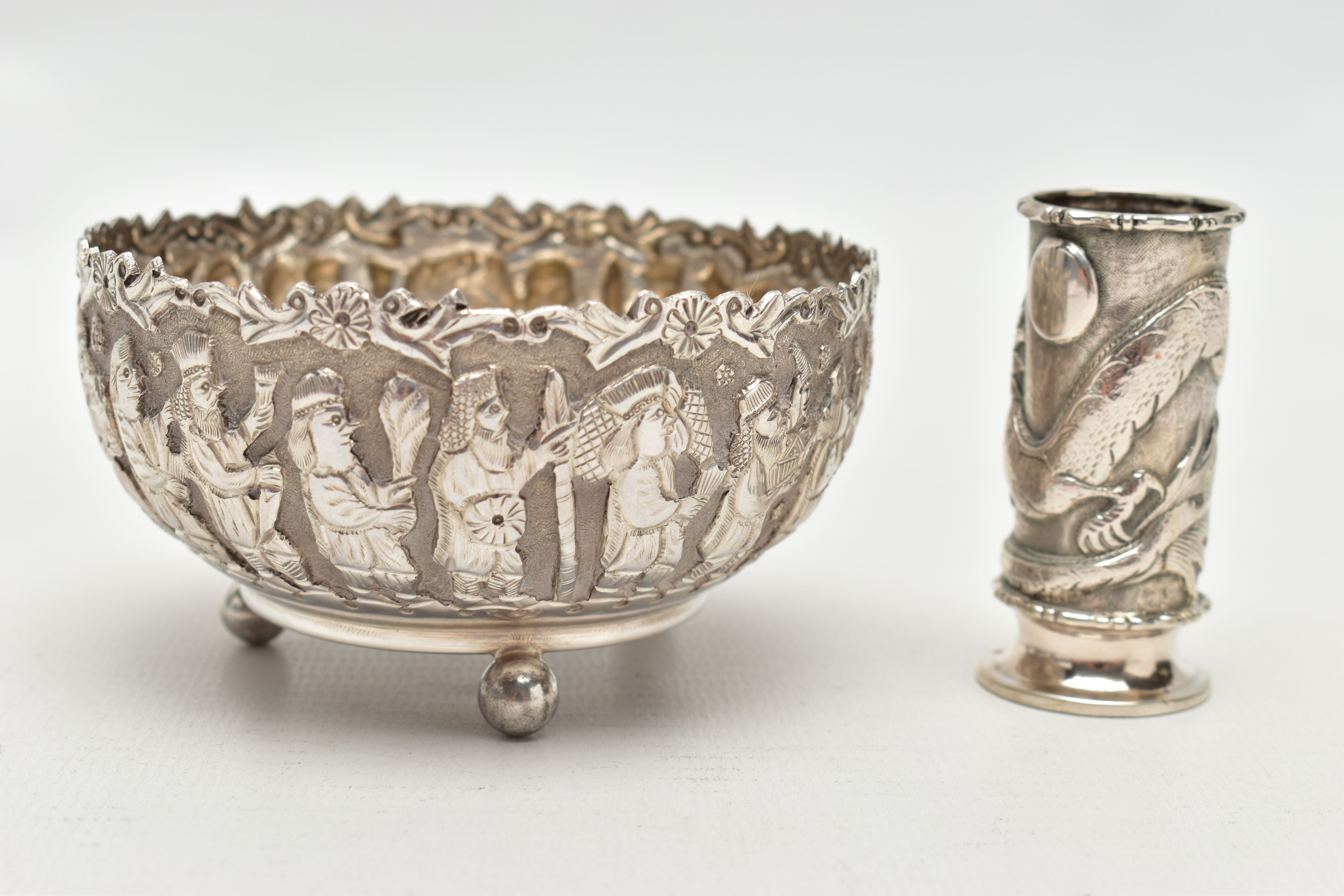 AN EMBOSSED WHITE METAL BOWL AND SMALL VASE, the round bowl decorated with embossed multiple figural - Image 3 of 7