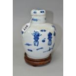 A CHINESE BLUE AND WHITE JAR AND COVER WITH WOODEN STAND, the jar and cover decorated with vases