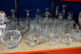 A QUANTITY OF CUT CRYSTAL comprising two Royal Doulton decanters, two square diamond cut