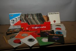 A TRAY CONTAINING OVER ONE HUNDRED AND THIRTY 7in SINGLES from the 1970s and 1980s including The