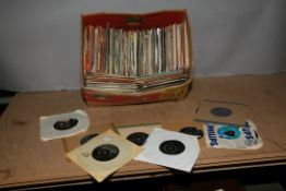 A TRAY CONTAINING OVER TWO HUNDRED 7in SINGLES including Cliff Richard , The Shadows, Elvis Presley,