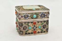 A WHITE METAL, ENAMEL AND GEM SET BOX, of a rectangular form, decorated with enamelled flowers and