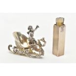 A SILVER TRAVEL PERFUME CASE AND A WHITE METAL FIGURINE, engine turned pattern to the rectangular