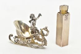 A SILVER TRAVEL PERFUME CASE AND A WHITE METAL FIGURINE, engine turned pattern to the rectangular