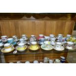 A COLLECTION OF TWENTY FOUR AYNSLEY COFFEE CANS / CUPS AND SAUCERS AND A CREAM JUG, assorted