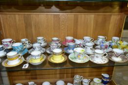 A COLLECTION OF TWENTY FOUR AYNSLEY COFFEE CANS / CUPS AND SAUCERS AND A CREAM JUG, assorted