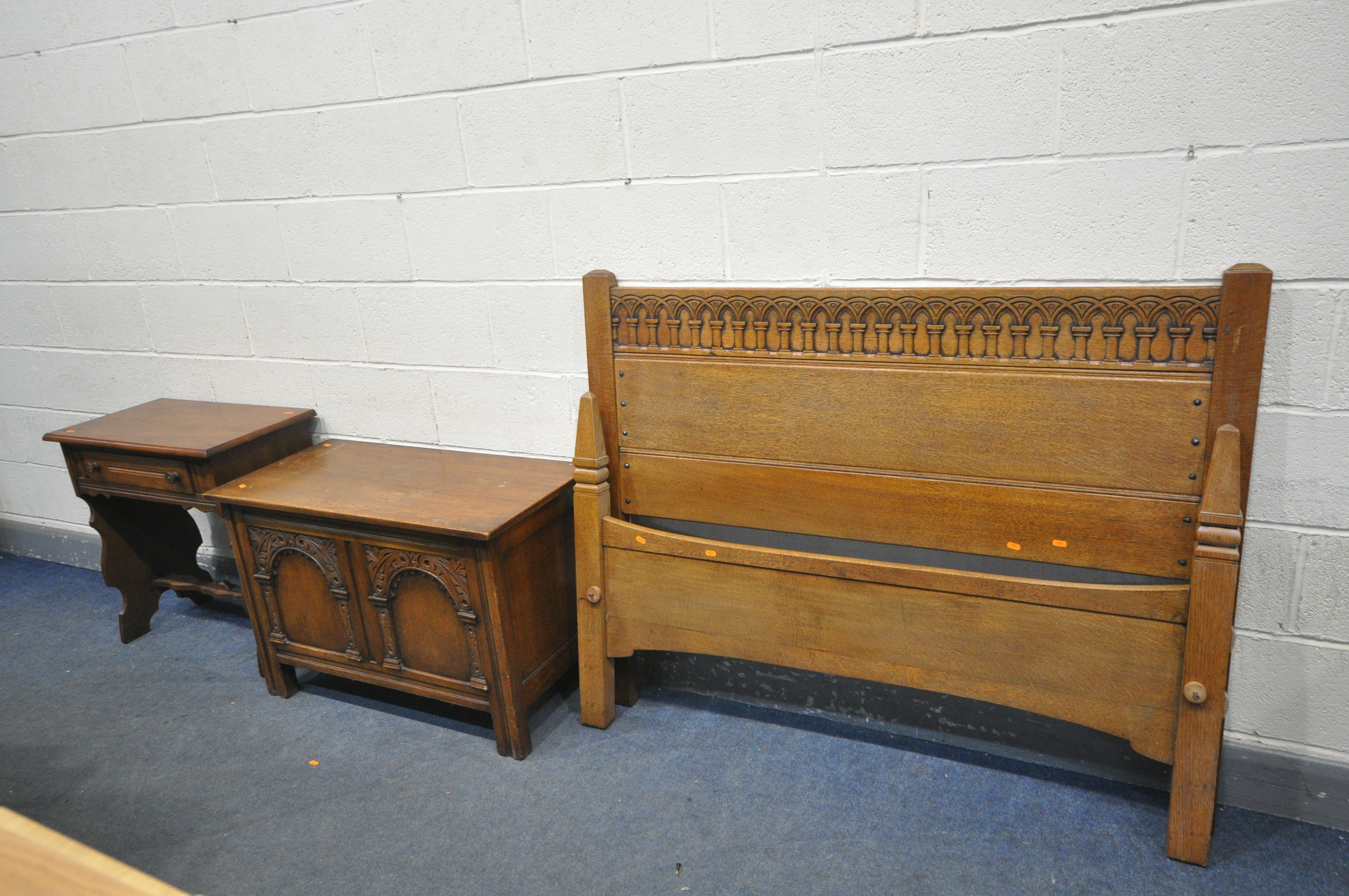 A 20TH CENTURY OAK BLANKET BOX, with hinged lid, and foliate detailing, width 92cm x depth 45cm x