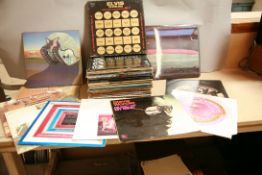 A TRAY CONTAINING OVER FIFTY LPs AND 12in SINGLES by Elvis Presley, Prince, David Bowie, Tarkus,