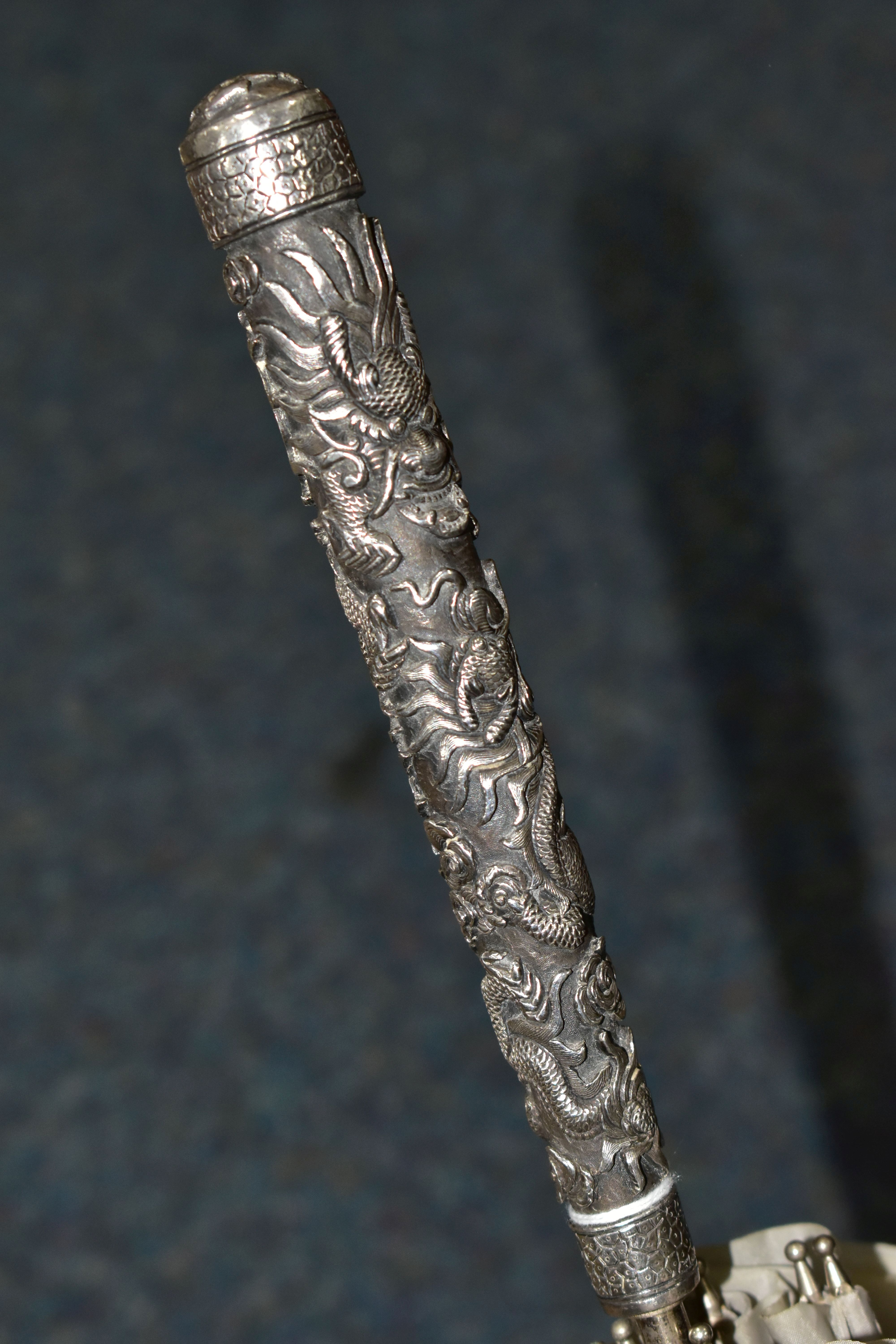 A CHINESE SILVER AND GREY UMBRELLA/PARASOL, with a white metal handle embossed with Dragons, - Image 4 of 7