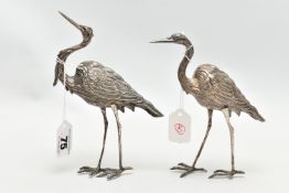 A PAIR OF WHITE METAL CRANE FIGURINES, realistically textured, approximate height 175mm, rubbed